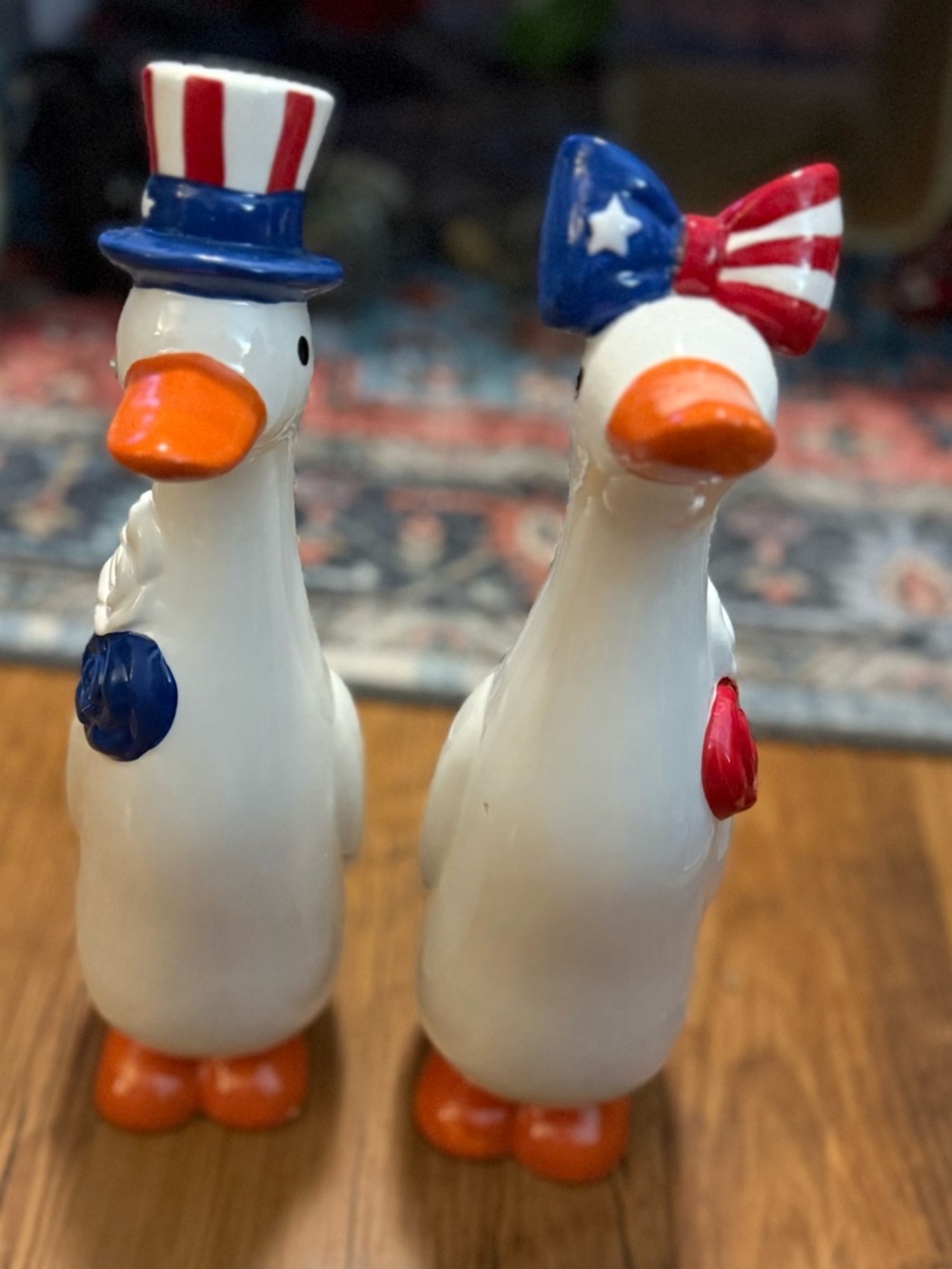 Patriotic White Ceramic Duck Figurines - Set of 2. 19 inches tall.
